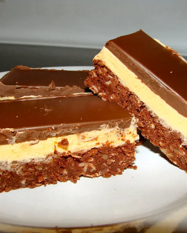 Nanaimo bars with a custard middle and chocolate top
